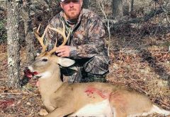 Phillip Hicks, founder of Pool Commander, with an 8-point Bay Co. buck.