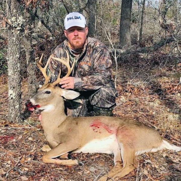 Phillip Hicks, founder of Pool Commander, with an 8-point Bay Co. buck.