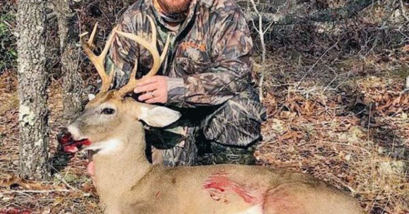 Phillip Hicks, founder of Pool Commander, with an 8-point Bay Co. buck.