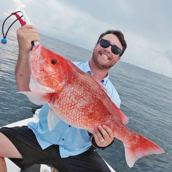 Preston with a stud nearshore snapper.