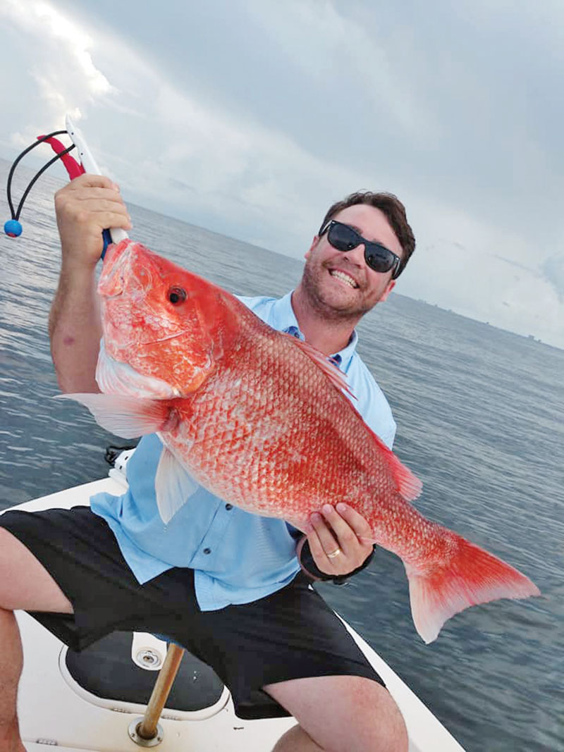 Preston with a stud nearshore snapper.