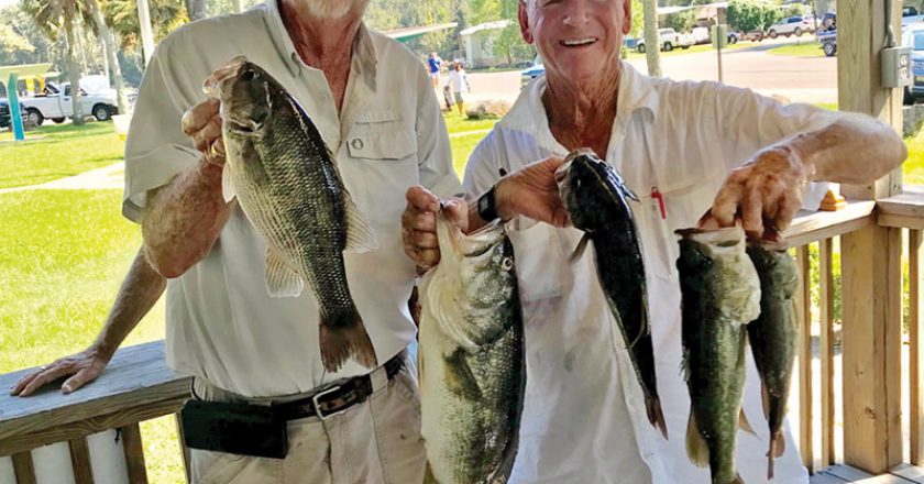 Red Holland and Frank Williams with their winning bag of 14.21 lbs and their 5.84 lb lunker in last month’s Reel Money Team Trail event.