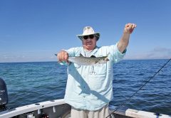 Reggie with a March Mac.