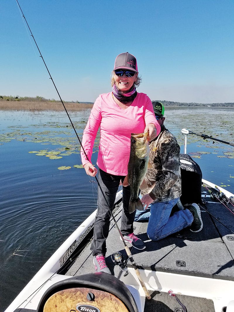 Rhonda Hastings holding up a nice 3-lber caught on another very tough windy day.