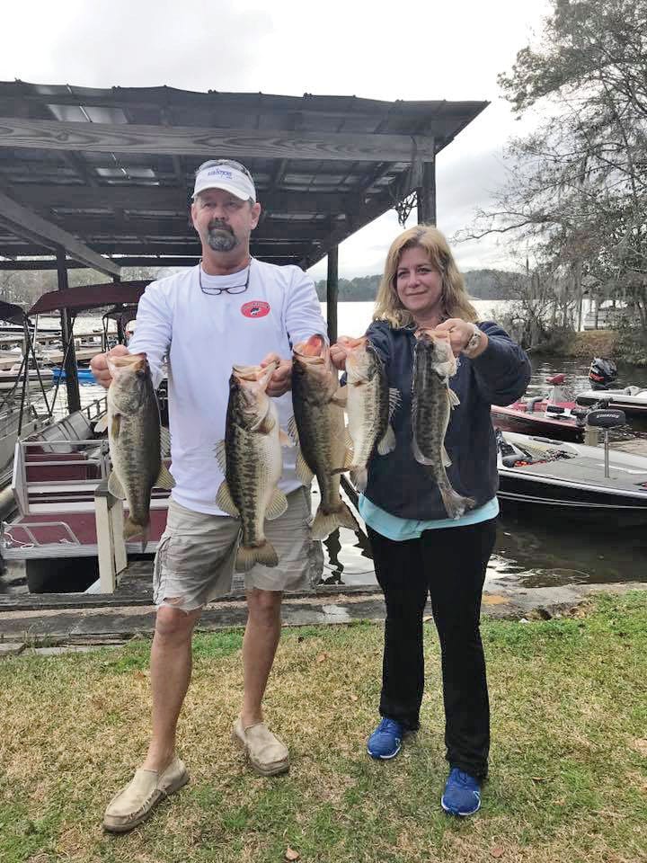 Talquin guide JR Mundinger and Julie Happersett with a nice bag of Talquin bass taken from the lily pads.