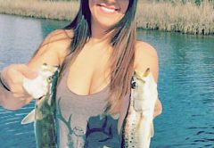 Taylor Wheeler with a pair of early season trout.