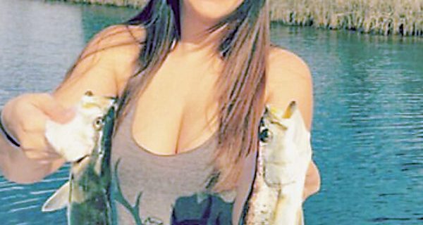 Taylor Wheeler with a pair of early season trout.