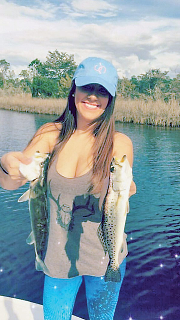 Taylor Wheeler with a pair of early season trout.