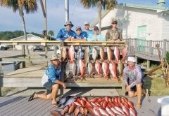 The Sawyer family with a great haul aboard the Kitchen Pass.