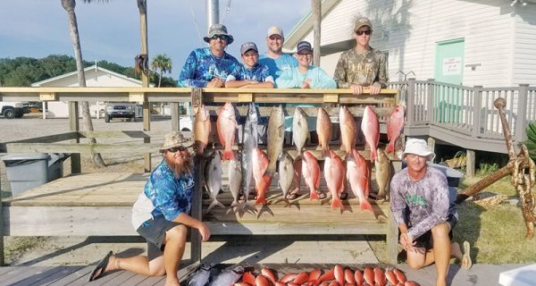 The Sawyer family with a great haul aboard the Kitchen Pass.