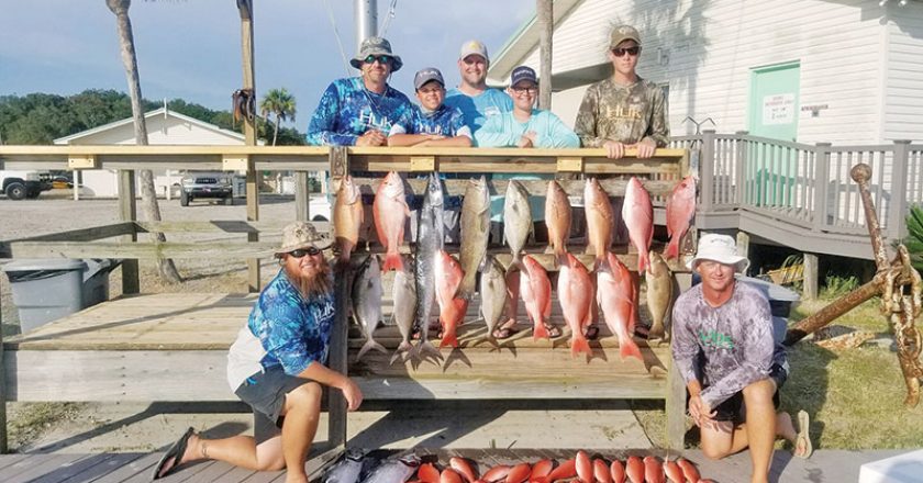 The Sawyer family with a great haul aboard the Kitchen Pass.