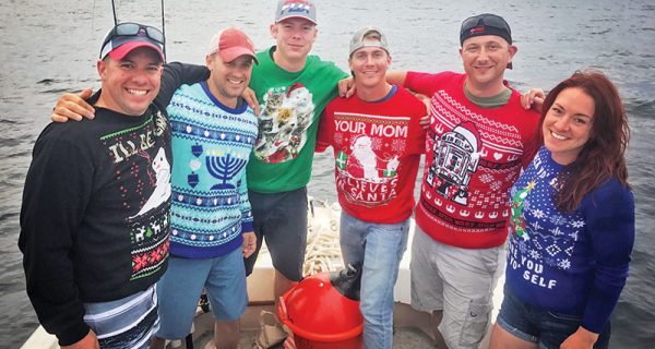 This Massachusetts National Guard unit fishing aboard the Kitchen Pass in their ugly Christmas Sweaters.