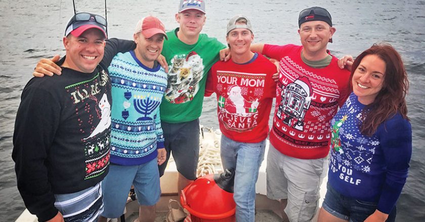 This Massachusetts National Guard unit fishing aboard the Kitchen Pass in their ugly Christmas Sweaters.