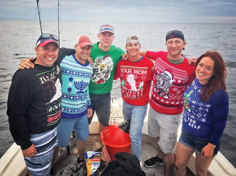 This Massachusetts National Guard unit fishing aboard the Kitchen Pass in their ugly Christmas Sweaters.