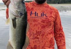 Tyler Gingrich of Panama City haulin’ bass with guide Paul Tyre.
