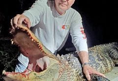 Vern Ward with his 9 ft., 350 lb. Washington County gator.