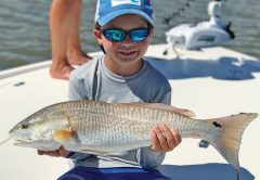 West McNalley from Atlanta pictured here with his biggest redfish ever.