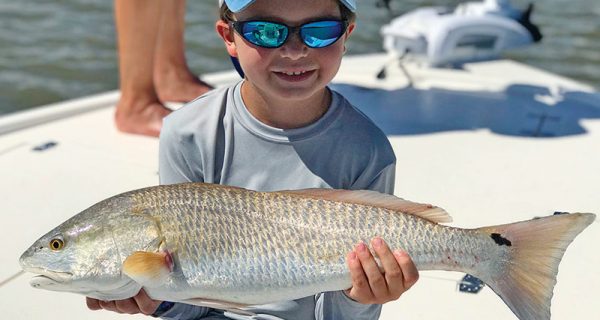 West McNalley from Atlanta pictured here with his biggest redfish ever.