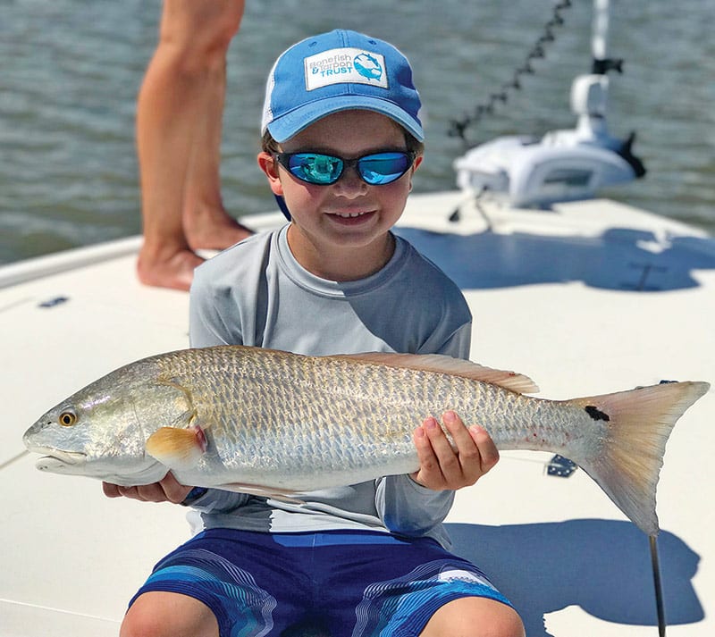 West McNalley from Atlanta pictured here with his biggest redfish ever.