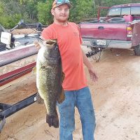 Will Nelson bagged the fish of a lifetime with this 12.87 lb beast from a Sandhill lake.