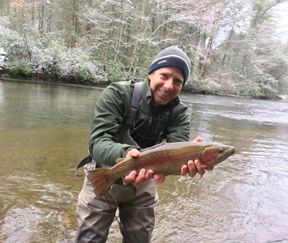 A nice Toccoa River delayed harvest rainbow with a snowy March background