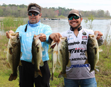 Paul Tyre and Nic Jeter with their winning catch in the Fishers of Men tournament 