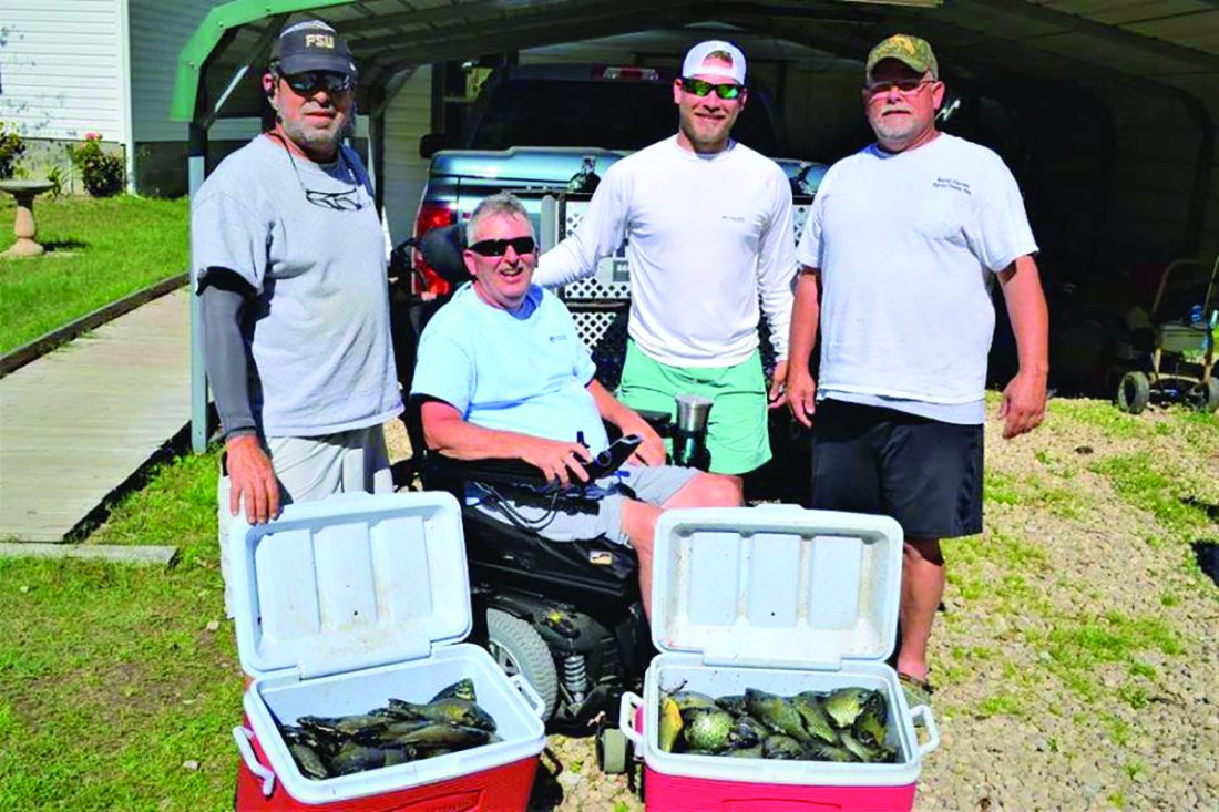 Paul Tyre, Angelo Koundourakis, Brandon and Neal Autry from Woodville, FL with a day's catch of Seminole shellcrackers 