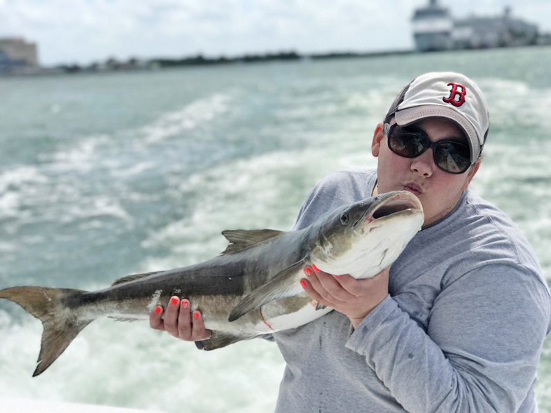 Nice cobia caught by this fisher gal on a sportfishing charter with Fishing Headquarters