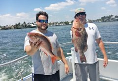 Clint and Jesse with a nice mutton snapper and red grouper caught on Catch My Drift