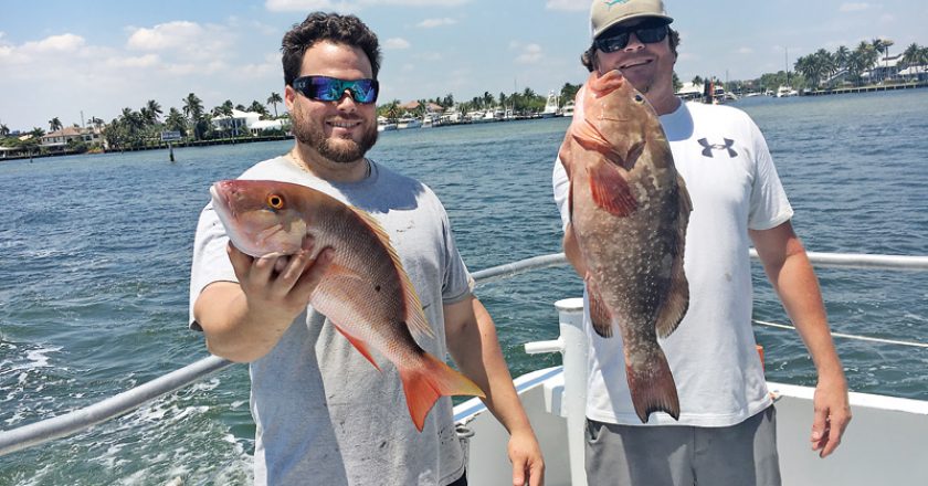 Clint and Jesse with a nice mutton snapper and red grouper caught on Catch My Drift