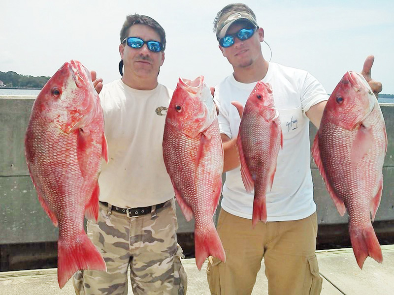 Ricky and Nick Gatlin got their limit  in the bay with Capt. Jason.