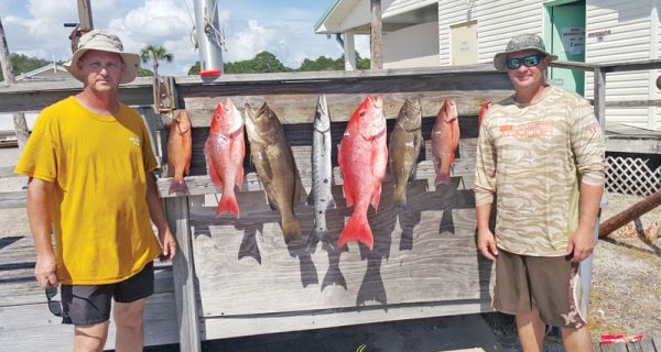 Capt. Tew and Tony Fiorenza with a nice haul aboard the Kitchen Pass.