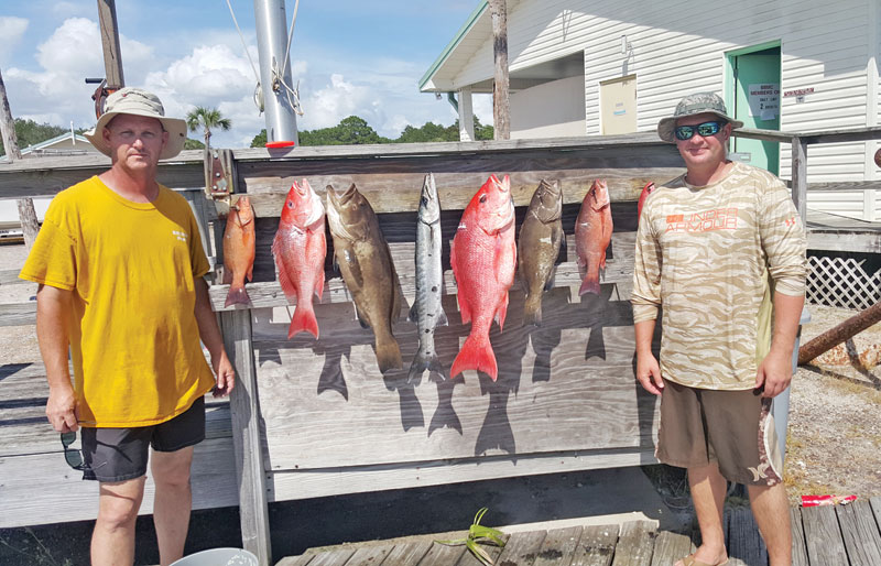 Capt. Tew and Tony Fiorenza with a nice haul aboard the Kitchen Pass.