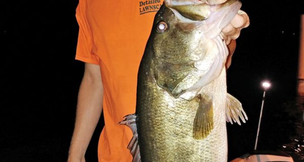 Will Nelson with a huge Deerpoint bass he recently caught.