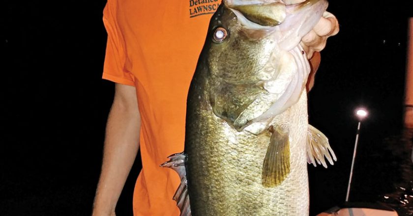 Will Nelson with a huge Deerpoint bass he recently caught.