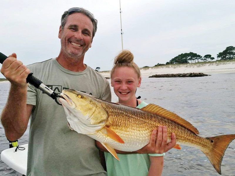 James McLain and daughter Kyra  of Panama City with a monster!