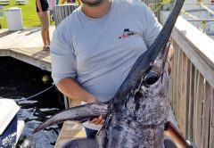 Kenny from Carl's Bait and Tackle with a nice swordfish caught off Ft Lauderdale.