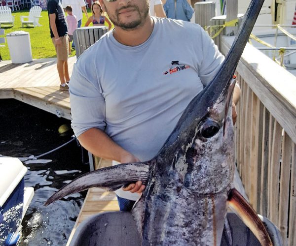 Kenny from Carl's Bait and Tackle with a nice swordfish caught off Ft Lauderdale.