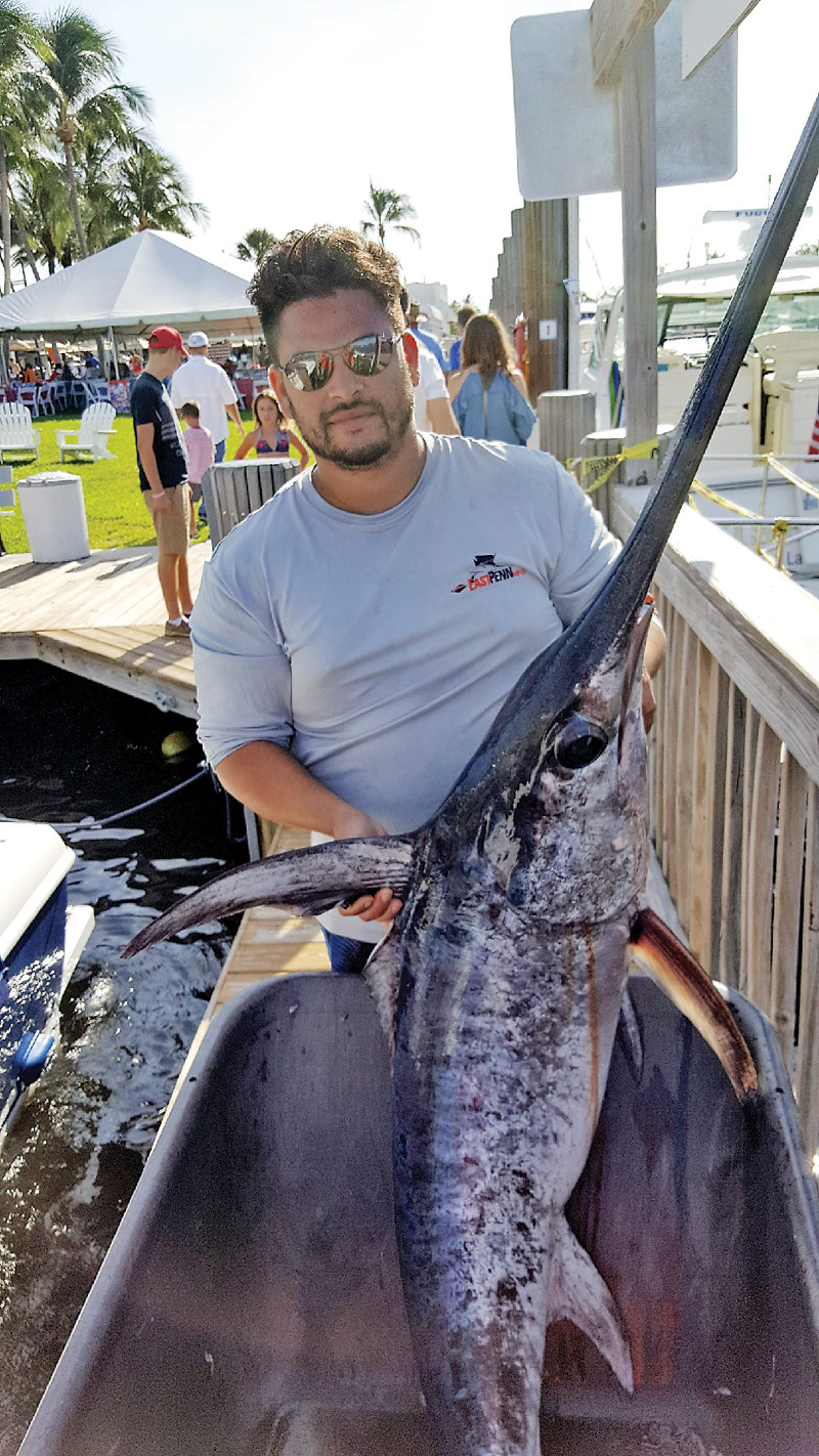 Kenny from Carl's Bait and Tackle with a nice swordfish caught off Ft Lauderdale.