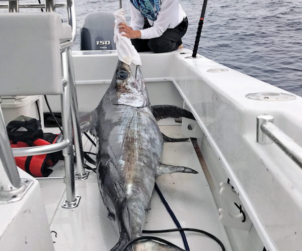 Sarah with a nice swordfish caught with New Lattitude Swordfishing.