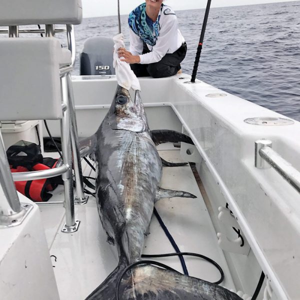 Sarah with a nice swordfish caught with New Lattitude Swordfishing.