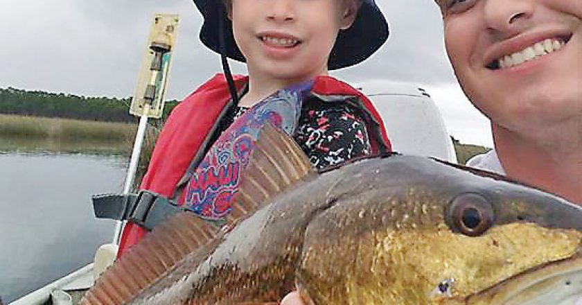 Christian was proud to see his son catch this red all by himself. Way to go Eli!