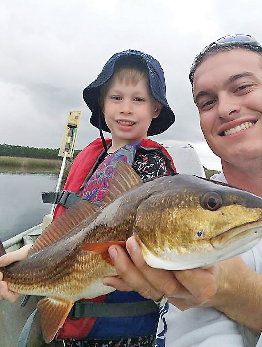 Christian was proud to see his son catch this red all by himself.  Way to go Eli!