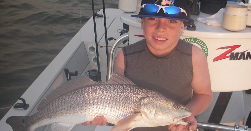 Cody nabs a great first ever redfish on his first ever fishing charter recently with Capt. Mark Wright. This top-slot red fell to a Z-Man Diezel Minnowz in the Sexy Mullet color!