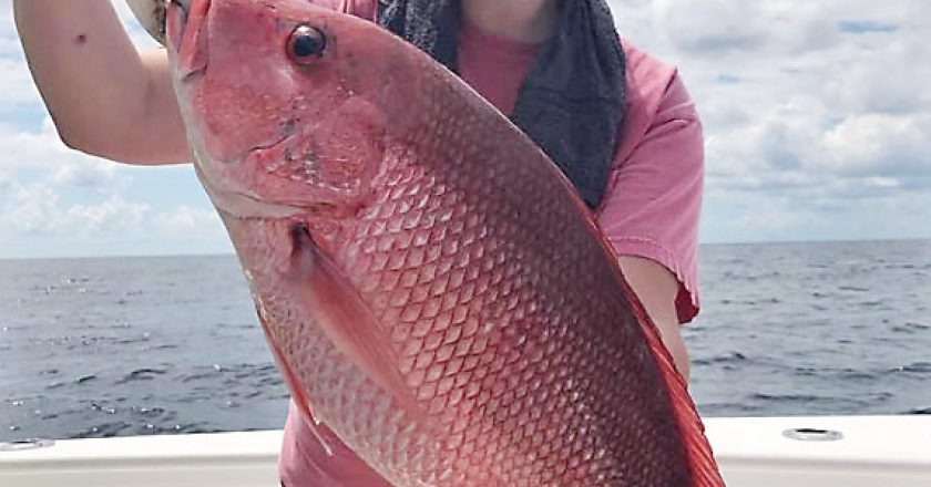 Jenna Skelton of Panama City with a fine red snapper.