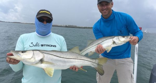 Rick Renfroe and John Denninghoff landed this nice pair of snook on live baits at the Canaveral jetty.