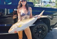 Sarah with a nice amberjack caught with New Lattitude Sportfishing.