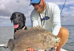 Capt. Jordan Todd and Murphy dog with a nice triple tail.