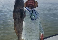 Landon Wells with a 17 lb 34 inch black drum caught in the Banana River in Cocoa