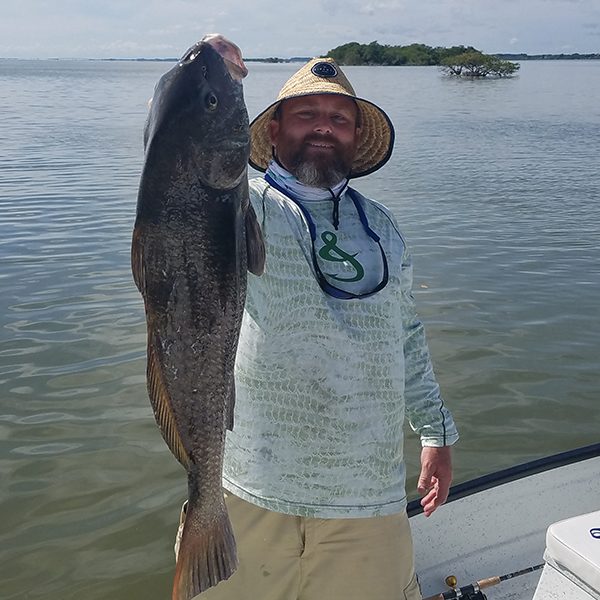 Landon Wells with a 17 lb 34 inch black drum caught in the Banana River in Cocoa